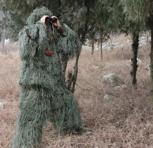 Camouflage Ghillie Suit Yowie Tactical Sniper in jungle setting.
