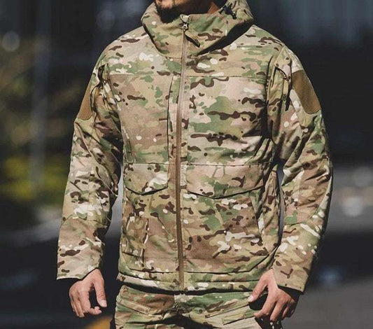 M65 MTP Winter Field Jacket in camouflage pattern, waterproof and fire resistant.